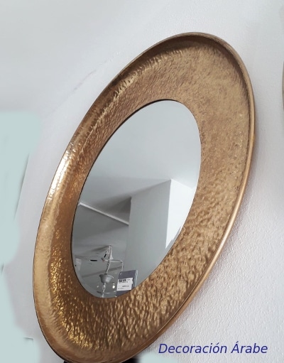 espejo redondo metálico dorado